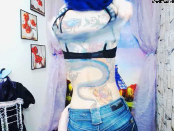 Goth Catriona Flashing Blue Hair and Back Tattoo