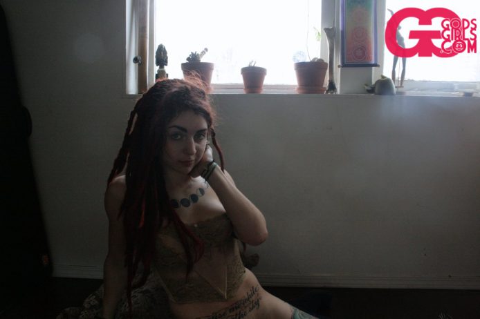 GodsGirls: Sativa stretches out on the floor