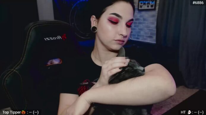 LevitheWinter Gives Her Kitty A Cuddle