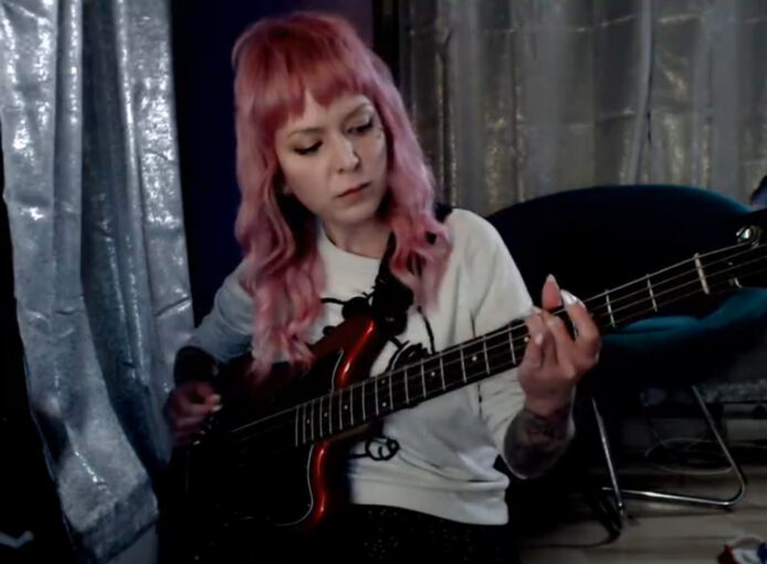 Myrafreecams Rocks Out With Her Bass Guitar