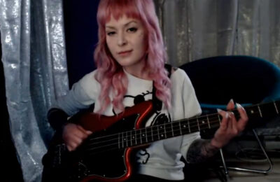Myrafreecams Rocks Out With Her Bass Guitar