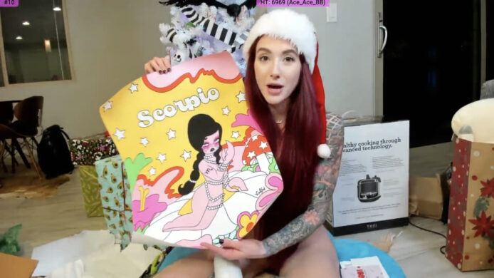 A Naked  KasaraWood Opens Up Her Christmas Presents