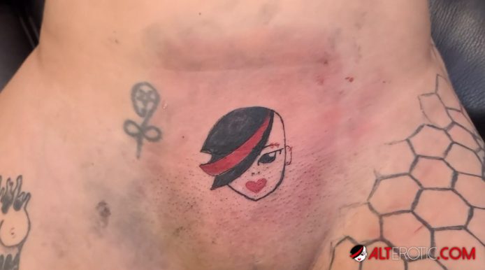 AltErotic: Nayomi Sharp Tattooing Herself The AltErotic Logo