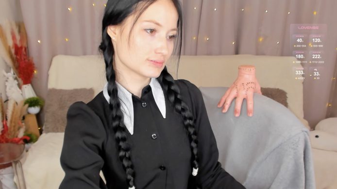 Lisamooore’s Wednesday Addams Uses Thing To Play