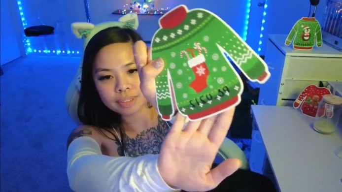 Dolllface Has Some Adorable Christmas Sweaters To Hand Out