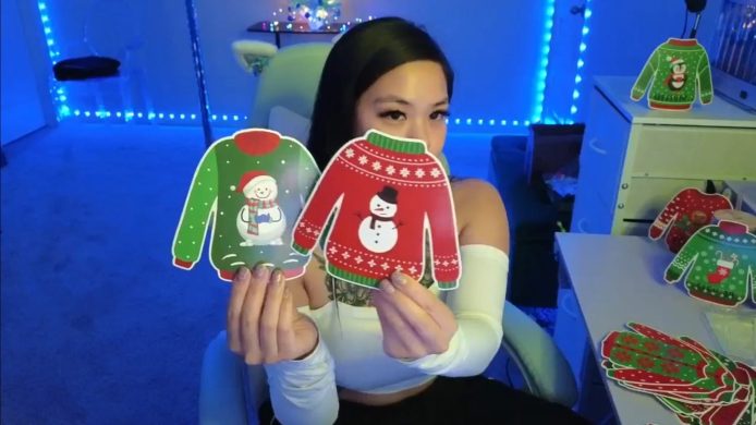 Dolllface Has Some Adorable Christmas Sweaters To Hand Out