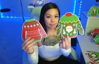 Dolllface Has Some Adorable Christmas Sweaters To Hand Out