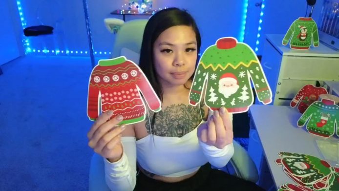 Dolllface Has Some Adorable Christmas Sweaters To Hand Out