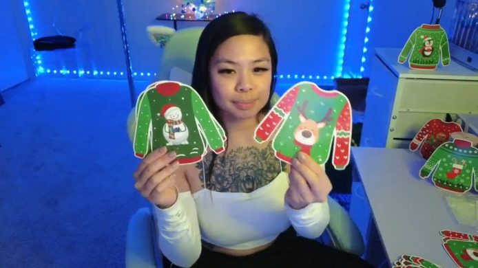 Dolllface Has Some Adorable Christmas Sweaters To Hand Out